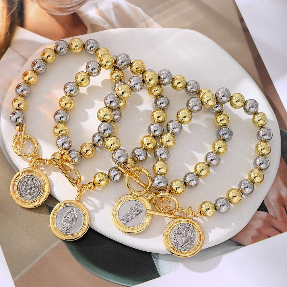 Brazalete religioso bicolor con medalla de San José acero inoxidable