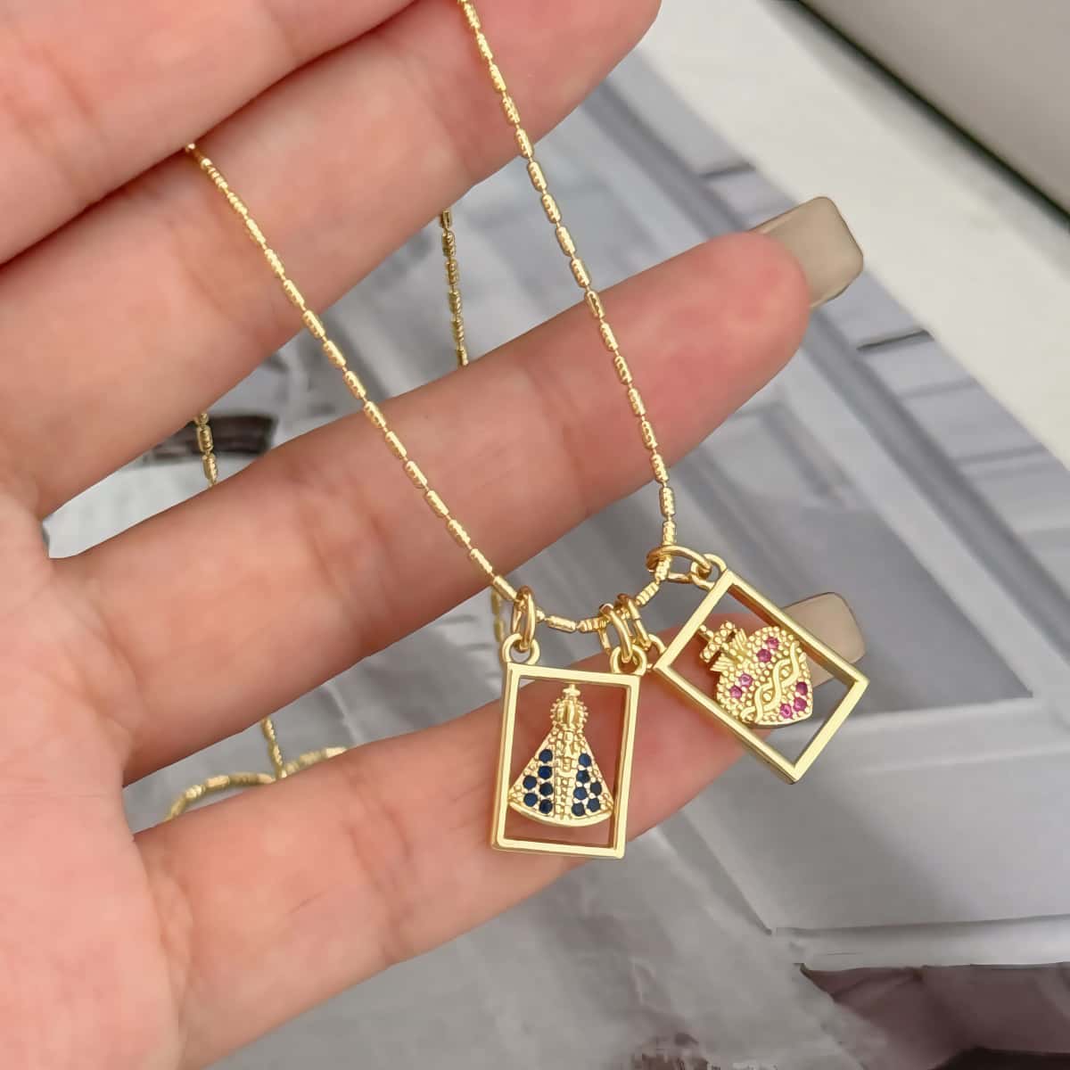 Religious copper necklace with two rectangular charms: Virgin and Sacred Heart 