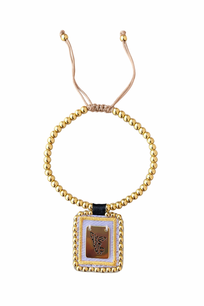 Spiritual bracelet with a medal of Saint Michael the Archangel and gold beads