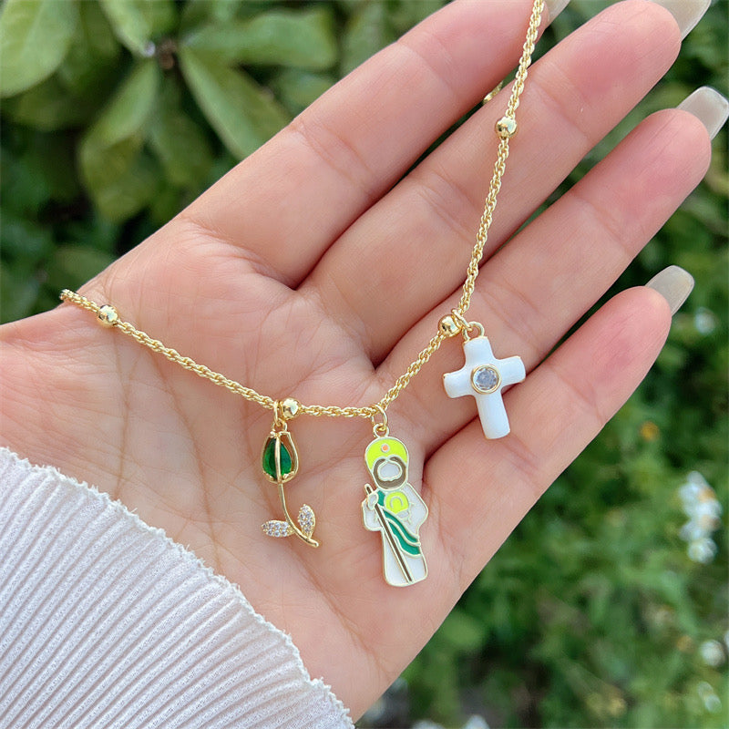 Trendy gold necklace with Saint Jude, cross and green rose