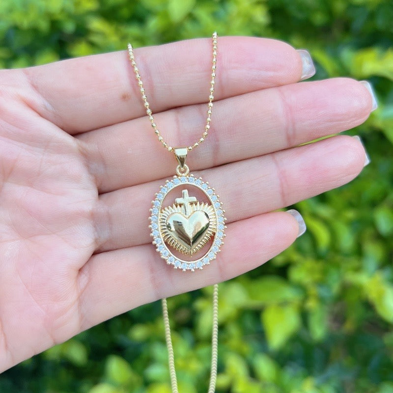 Gold necklace with Sacred Heart and oval sparkle