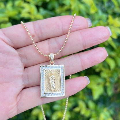 Gold necklace with Saint Jude in a rectangular frame with shine