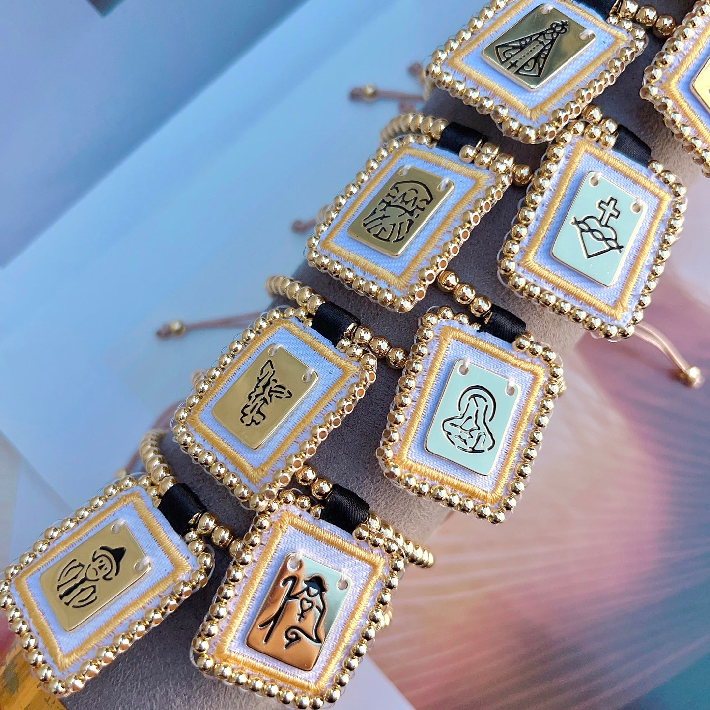 Spiritual bracelet with St. Benedict medal and gold beads