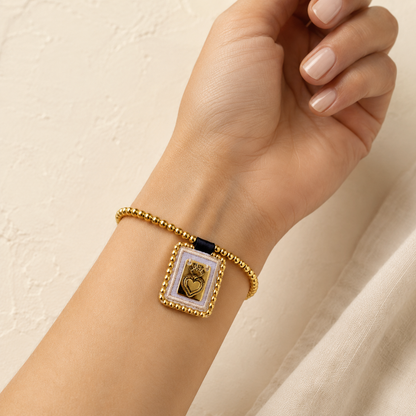 Spiritual bracelet with Sacred Heart medal and gold beads