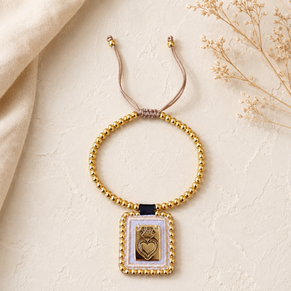Spiritual bracelet with Sacred Heart medal and gold beads