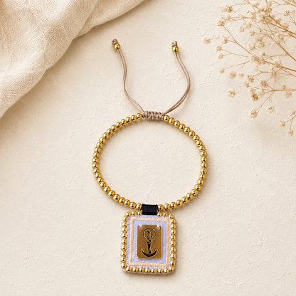 Spiritual bracelet with a medal of the Virgin of Chiquinquira and gold beads