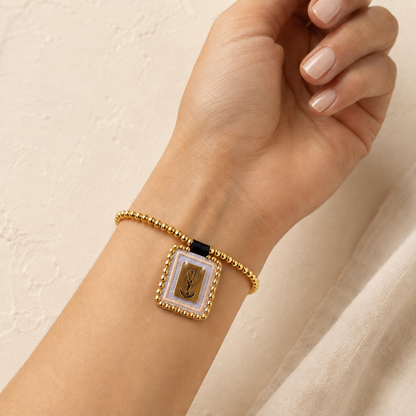 Spiritual bracelet with a medal of the Virgin of Chiquinquira and gold beads