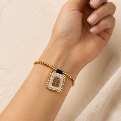 Spiritual bracelet with St. Benedict medal and gold beads