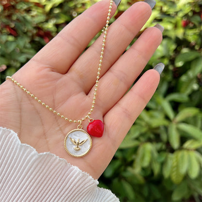 Collar religioso con medalla de Espíritu Santo y dije de corazón