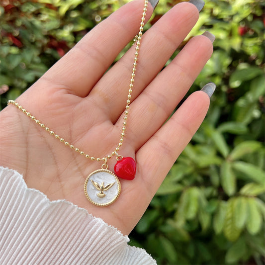 Collar religioso con medalla de Espíritu Santo y dije de corazón