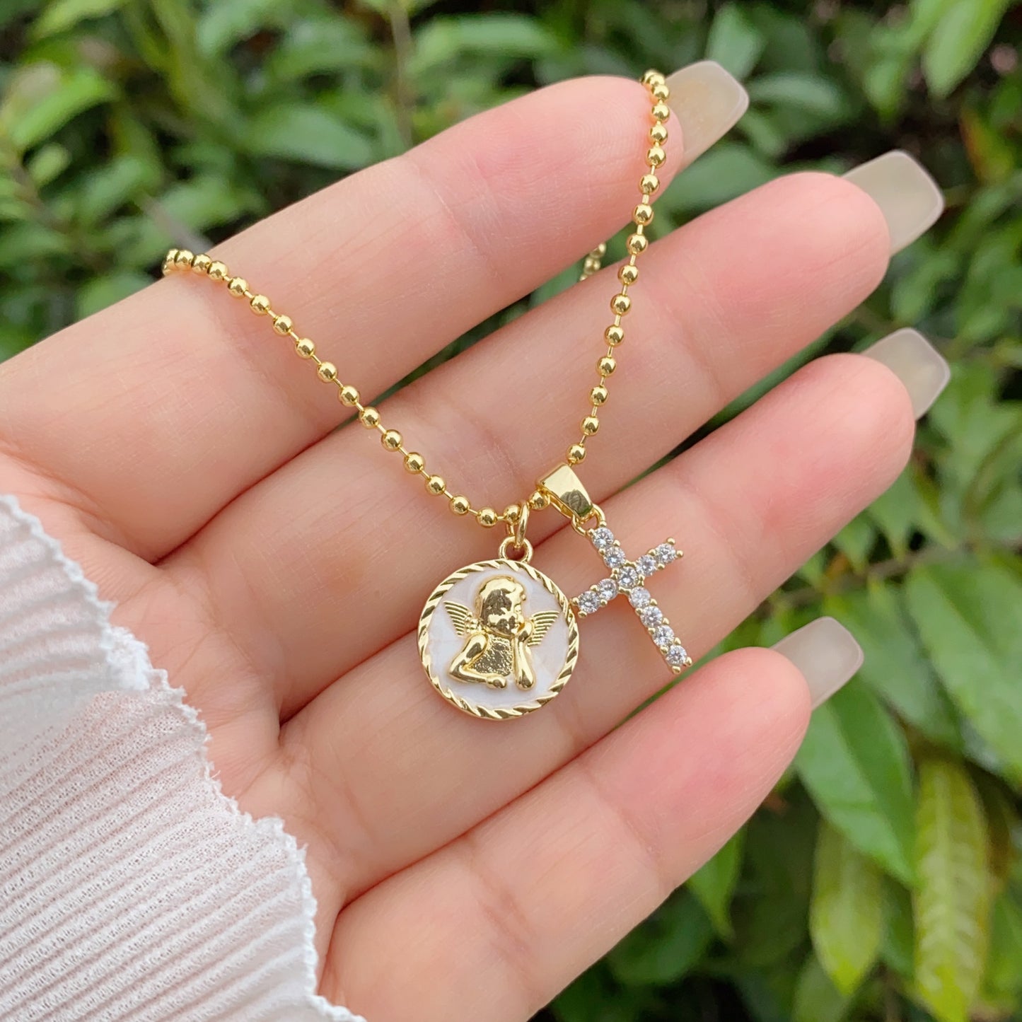 Religious necklace angel and cross in gold-plated stainless steel 